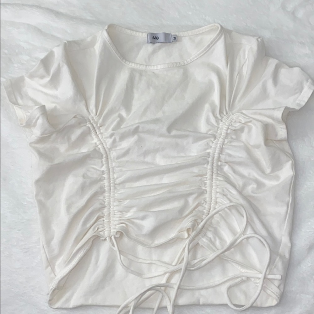 White Adika brand pull string crop top